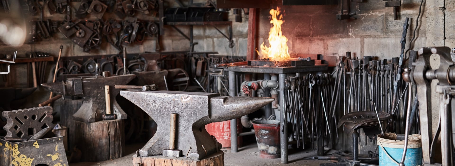 Forge with anvil and flames